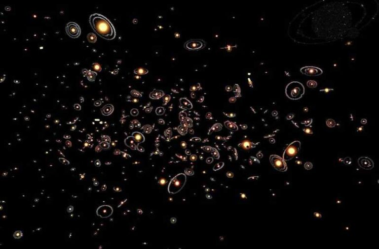 Esta visão artística dá uma ideia de como os planetas são comuns em torno das estrelas da Via Láctea. Os planetas, suas órbitas e suas estrelas-mãe estão todos amplamente ampliados em relação às suas distâncias reais. Uma pesquisa de seis anos que rastreou milhões de estrelas usando a técnica de microlente concluiu que os planetas em torno das estrelas são a regra e não a exceção. O número médio de planetas por estrela é superior a um. Crédito: ESO/M. Kornmesser.